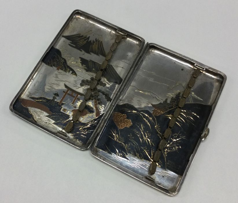 A Japanese silver cigarette case. Marked to interi - Image 2 of 3