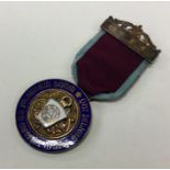 OF ROYAL INTEREST: A silver and enamelled medal. L