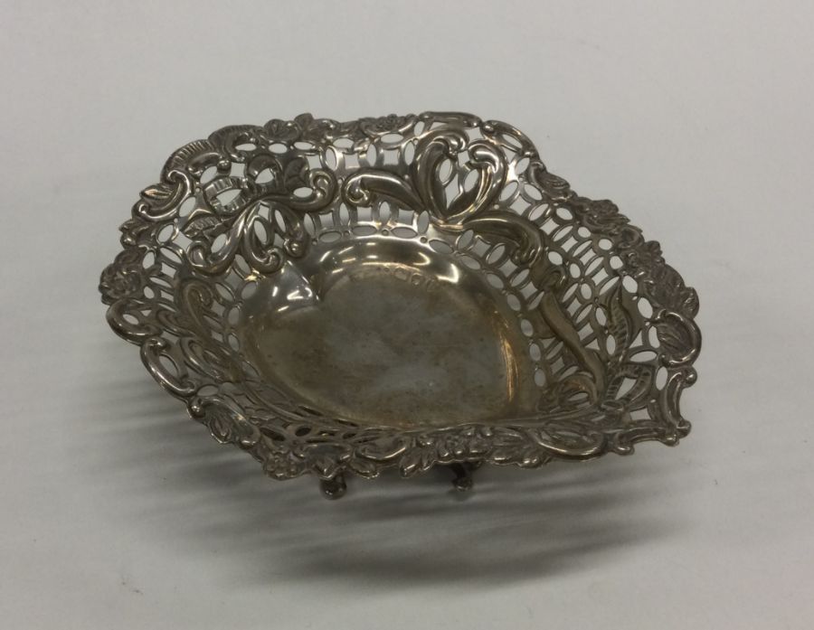 An Edwardian silver heart shaped bonbon dish. Lond