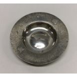 A circular commemorative silver armada dish for th