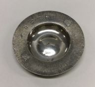 A circular commemorative silver armada dish for th