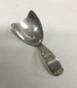 An unusual shaped silver caddy spoon. London 1808.