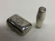 A heavy tapering silver needle case together with
