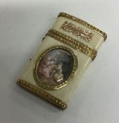 A good ivory and gold card case with miniature cen