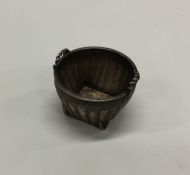 A Chinese silver wicker basket of circular form. A