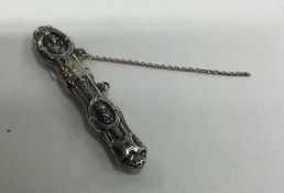 A chased silver cheroot case. Approx. 8 grams. Est