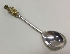 A silver spoon with a Queen’s Beast terminal. Appr