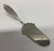 A Continental silver engraved fish slice. Approx.