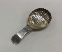 An Antique silver caddy spoon. Marked Sterling wit