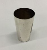 A silver beaker. Approx. 21 grams. Est. £20 - £30.