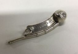 A rare Victorian silver whistle of typical form. B
