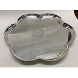 A rare George I silver hexafoil shaped salver with