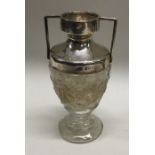 A silver and glass trophy cup. Birmingham 1906. By G&S. Est. £30 - £50.
