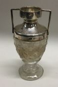 A silver and glass trophy cup. Birmingham 1906. By G&S. Est. £30 - £50.