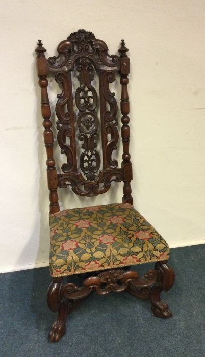 A large Continental hall chair. Est. £25 - £30.