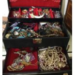 A box containing costume jewellery. Est. £20 - £30