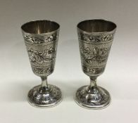 A pair of Continental engraved silver goblets. Approx. 89 grams. Est. £80 - £120.