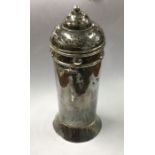 A stylish silver sugar caster of shaped form. Lond