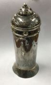 A stylish silver sugar caster of shaped form. Lond