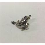 A silver model of a frog. Approx. 22 grams. Est. £20 - £30.