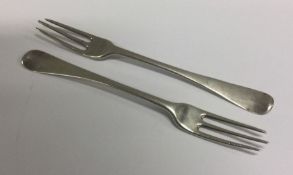 Two early three prong silver forks. London. Approx. 57 grams. Est. £100 - £120.