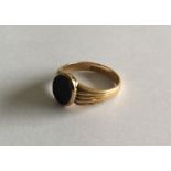 A large 15 carat gent's signet ring with reeded de
