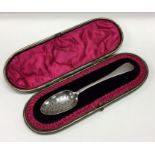 A cased Victorian silver pierced mote spoon. Birmingham 1893. By HJ Cooper and Co. Approx. 25 grams.