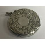 A rare round finely engraved silver vesta case. Birmingham 1905. Approx. 20 grams. Est. £40 - £60.