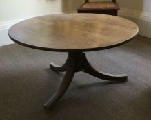 An oak low occasional table. Est. £50 - £80.