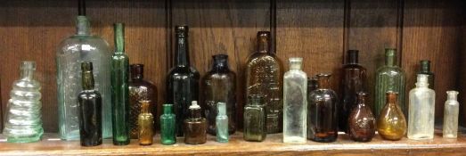 A group of old glass bottles. Est. £10 - £20.