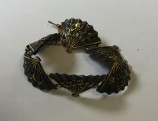 A good Japanese six panel bracelet decorated with