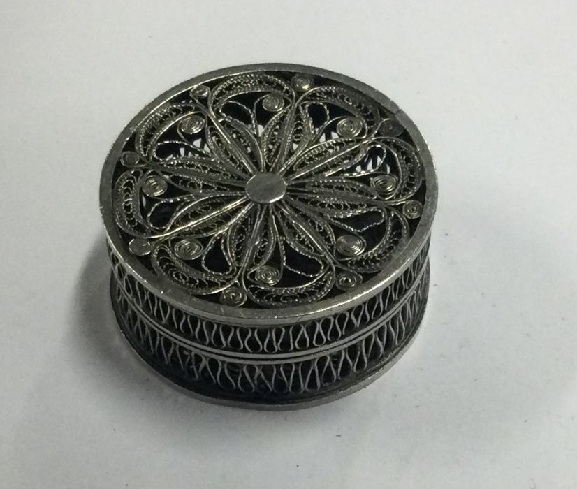 A Georgian silver filigree counter box. Approx. 7 grams. Est. £200 - £250.