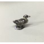 A heavy silver paperweight in the form of a duck. Approx. 17 grams. Est. £30 - £50.