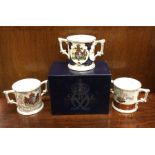 A group of four Royal Crown Derby souvenir two han