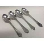 A rare set of four early dog nose silver spoons. London 1699. Approx. 248 grams. Est. £800 - £1200.