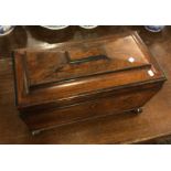 A rosewood tea caddy with hinged top. Est. £30 - £