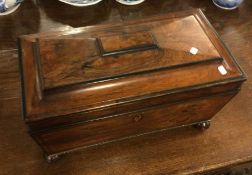 A rosewood tea caddy with hinged top. Est. £30 - £