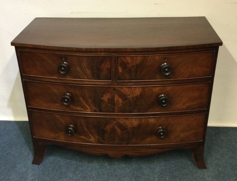 A mahogany four drawer bow front chest. Est. £100 - Image 2 of 2