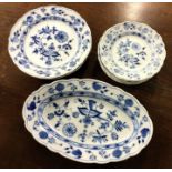 MEISSEN: A collection of blue and white plates. Es