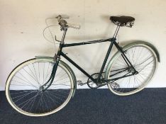 An old BSA bicycle. Est. £30 - £50.
