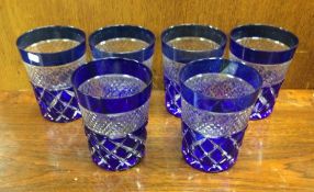 A set of six etched glass glasses. Est. £20 - £30.