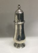 An early 18th Century silver caster. Apparently unmarked. Approx. 49 grams. Est. £100 - £120.