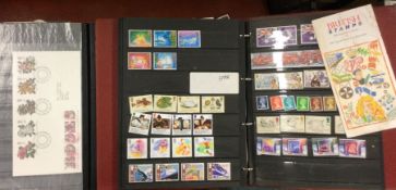Two albums of stamps and first day covers. Est. £2