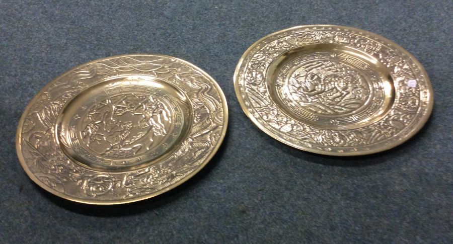 A heavy pair of Chinese circular brass plates deco