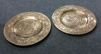 A heavy pair of Chinese circular brass plates deco