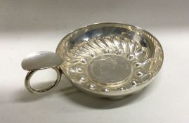 A 19th Century French silver wine taster with early French coin to centre. Approx. 93 grams. Est. £