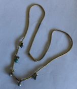 An Antique gold snake link necklace with barrel cl