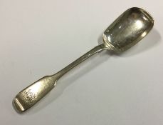 A large silver fiddle pattern jam spoon. London. B