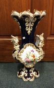 A massive late Victorian blue and white gilded vas