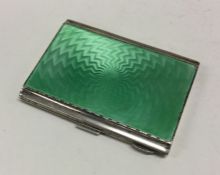 A heavy silver and green enamel case. Birmingham 1932. By William Neale and Son. Approx. 92 grams.